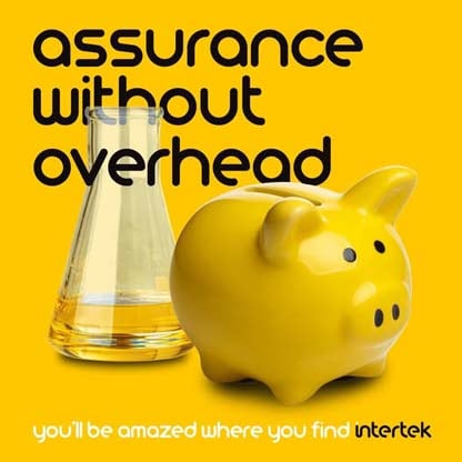 A yellow piggybank next to a flask of liquid