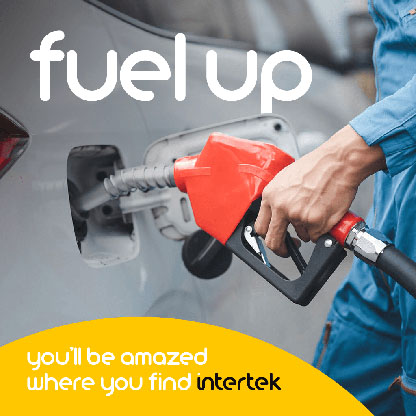 A car being refueled at a filling station